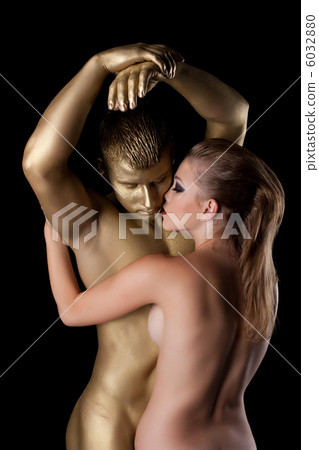 Beauty naked couple posing with metal skin Beauty naked couple posing with metal skin 6032880