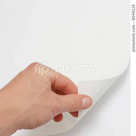 Hand turning page 6049226