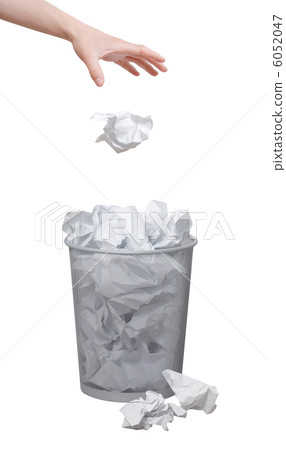Hand throwing out paper 6052047