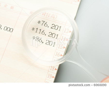 Expand bank deposit passbook with magnifying glass Expand bank deposit passbook with magnifying glass 6068890