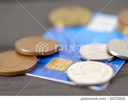 Credit card and coins Credit card and coins 6070068