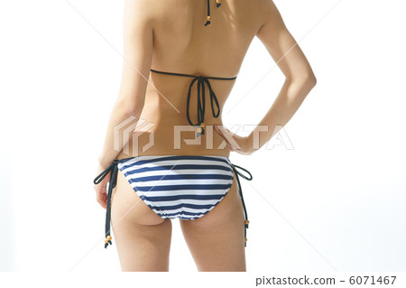 A young woman in a bathing suit A young woman in a bathing suit 6071467