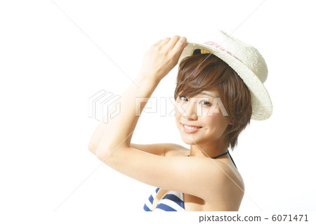 A young woman in a bathing suit 6071471