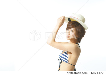 A young woman in a bathing suit A young woman in a bathing suit 6071472