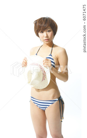 A young woman in a bathing suit A young woman in a bathing suit 6071475