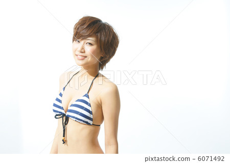 A young woman in a bathing suit A young woman in a bathing suit 6071492