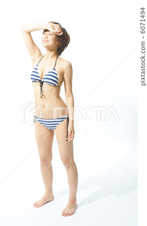 A young woman in a bathing suit A young woman in a bathing suit 6071494