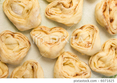 Half-finished product of a roll with cinnamon 6071825