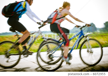 cyclists in motion cyclists in motion 6072955