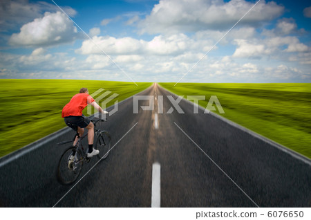 man biking on road man biking on road 6076650