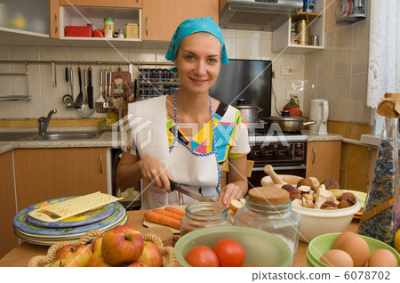 Young woman cooking 6078702