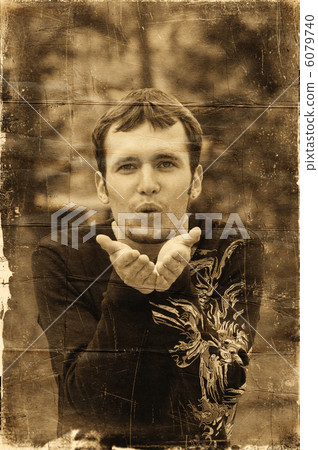 Man sending a kiss Man sending a kiss 6079740