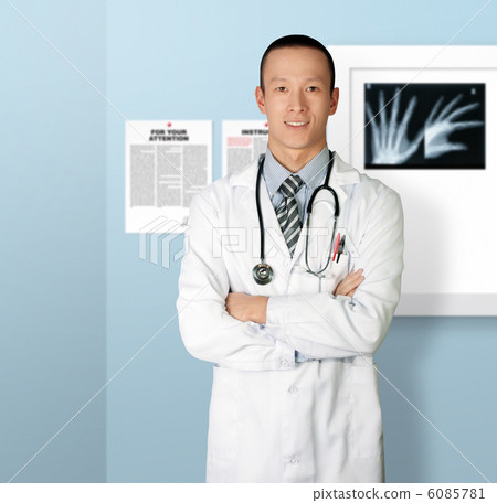 doctor smiles at camera doctor smiles at camera 6085781