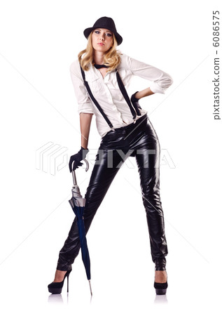 Attractive woman dancing in leather suit 6086575
