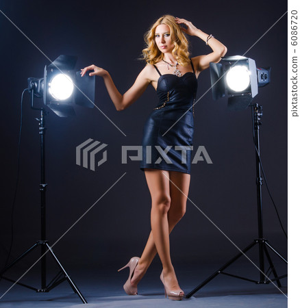 Young attractive woman in photo studio Young attractive woman in photo studio 6086720