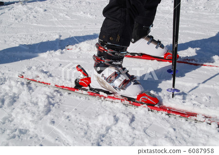 Men wearing ski boots Men wearing ski boots 6087958