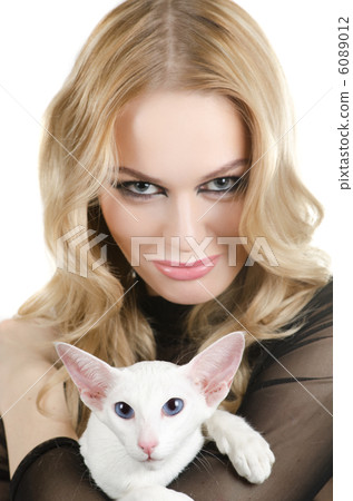 woman with oriental shorthair cat woman with oriental shorthair cat 6089012