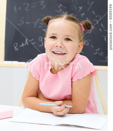Portrait of a little girl in school Portrait of a little girl in school 6089349