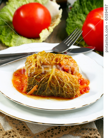 Stuffed tomato sauce and Savoy cabbage. Stuffed tomato sauce and Savoy cabbage. 6089497