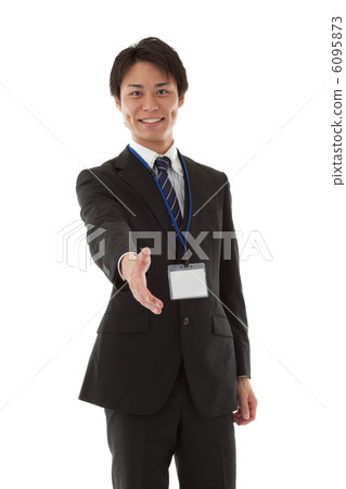 Businessman seeking handshake 6095873