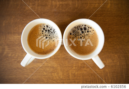 Two whte cups with espresso Two whte cups with espresso 6102856