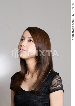 A woman in black clothes A woman in black clothes 6102918