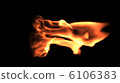 Fire flames close up against black 6106383