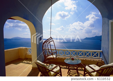 A terrace with a swing 6110532