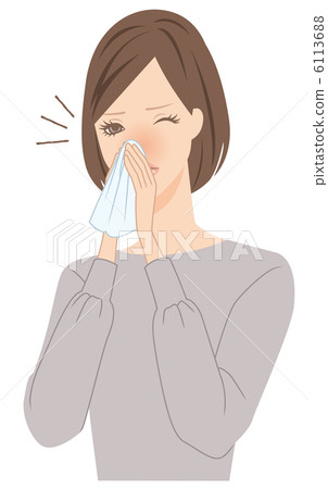 Woman blowing her nose 6113688