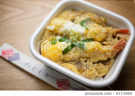 Bowl of rice and fried fish 6113969