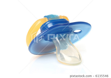 Blue baby pacifier on a white background Blue baby pacifier on a white background 6135546