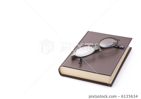 Closed books and glasses on white background Closed books and glasses on white background 6135634