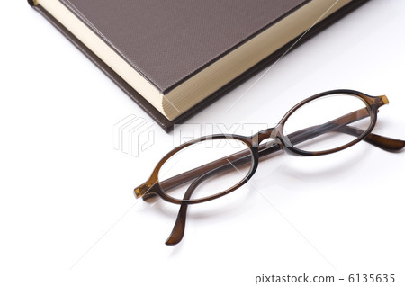 Glasses and books on white background Glasses and books on white background 6135635