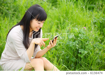 Girls using smartphones 6136474