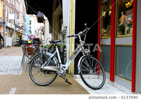 Bike is parked near  shop in Gorinchem. Netherlands 6137090