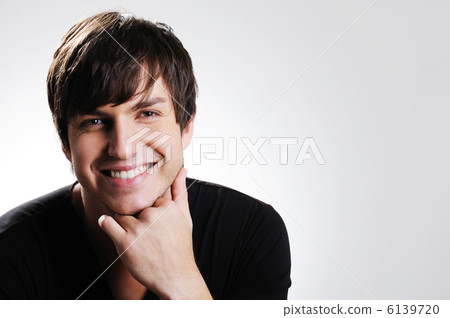 Handsome happy young guy Handsome happy young guy 6139720