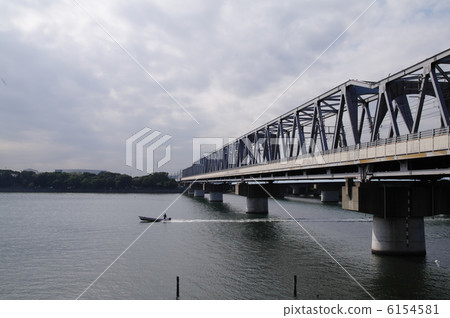 A bridge and a fishing boat 6154581