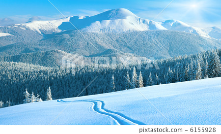 winter mountain panorama with ski track 6155928