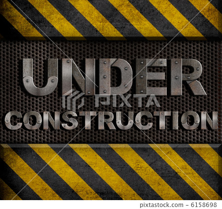 "under construction" metal text with rivets over grid 6158698