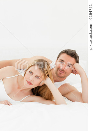 Happy lovers looking at the camera Happy lovers looking at the camera 6164721