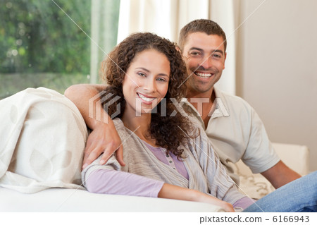 Joyful couple looking at the camera 6166943