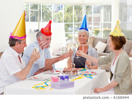 Seniors on birthday at home 6166944