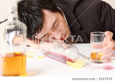 A businessman who is drunk 6167476