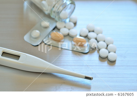 Thermometer and medicine Thermometer and medicine 6167605