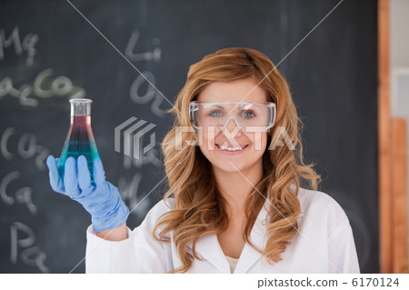 Young female scientist looking at the camera Young female scientist looking at the camera 6170124