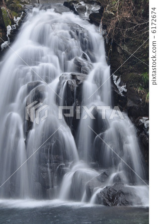 Red-eye-standed waterfall in winter 6172674
