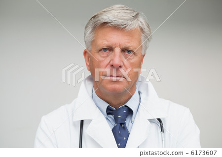 Mature doctor looking serious 6173607