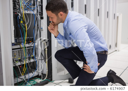 Technican checking server 6174907