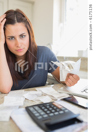 Young woman feeling financial pressure Young woman feeling financial pressure 6175136
