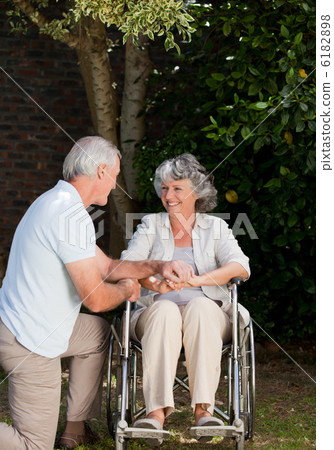 Mature couple in the garden Mature couple in the garden 6182898